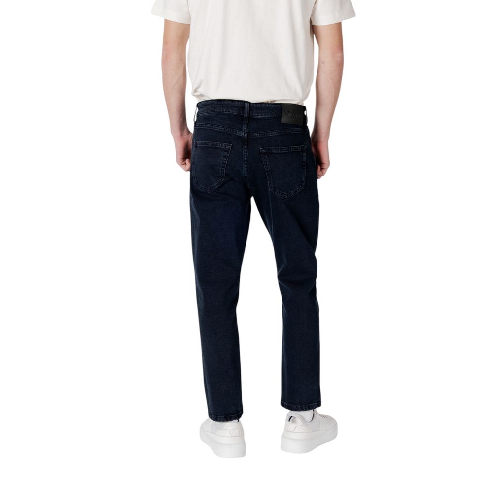 Vaqueros y pantalones de algodón azul