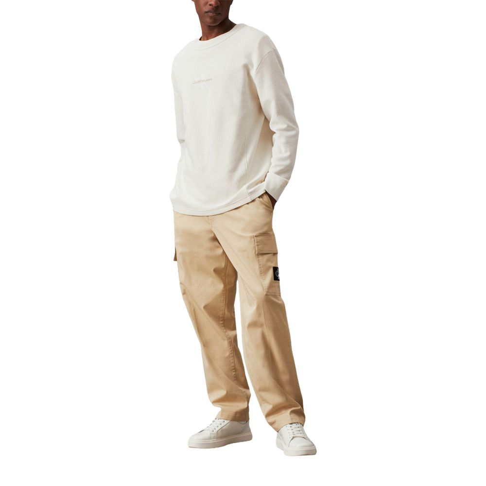 Vaqueros y pantalones de algodón beige