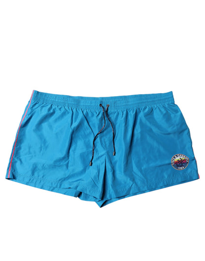 Traje de baño de dos piezas con shorts de playa y logo turquesa