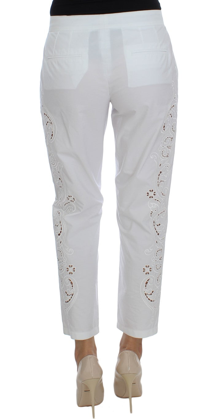 Elegante pantalón de vestir blanco con recortes florales