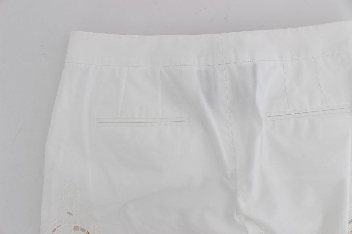 Elegante pantalón de vestir blanco con recortes florales