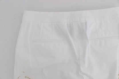 Elegante pantalón de vestir blanco con recortes florales