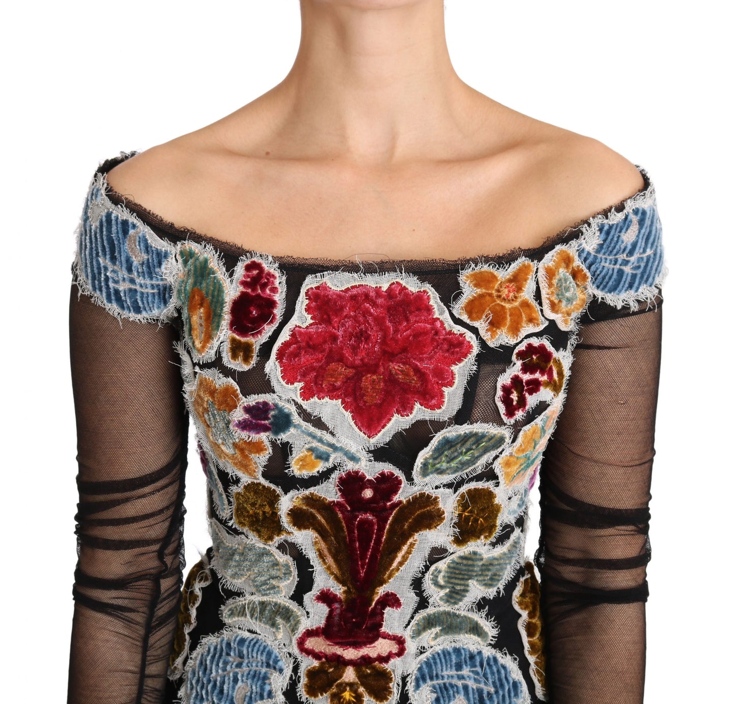Elegante blusa de manga larga con apliques florales