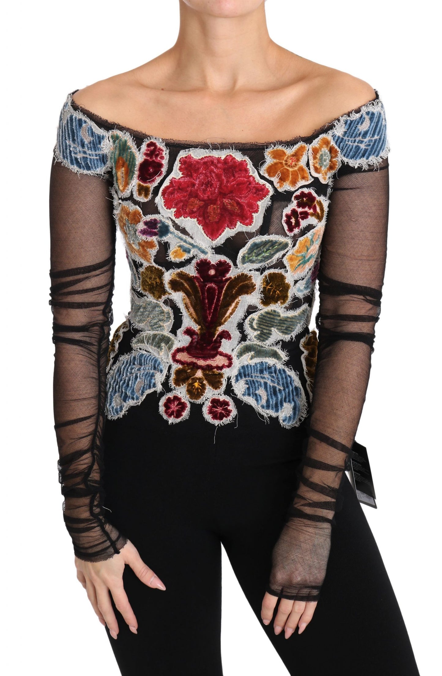 Elegante blusa de manga larga con apliques florales