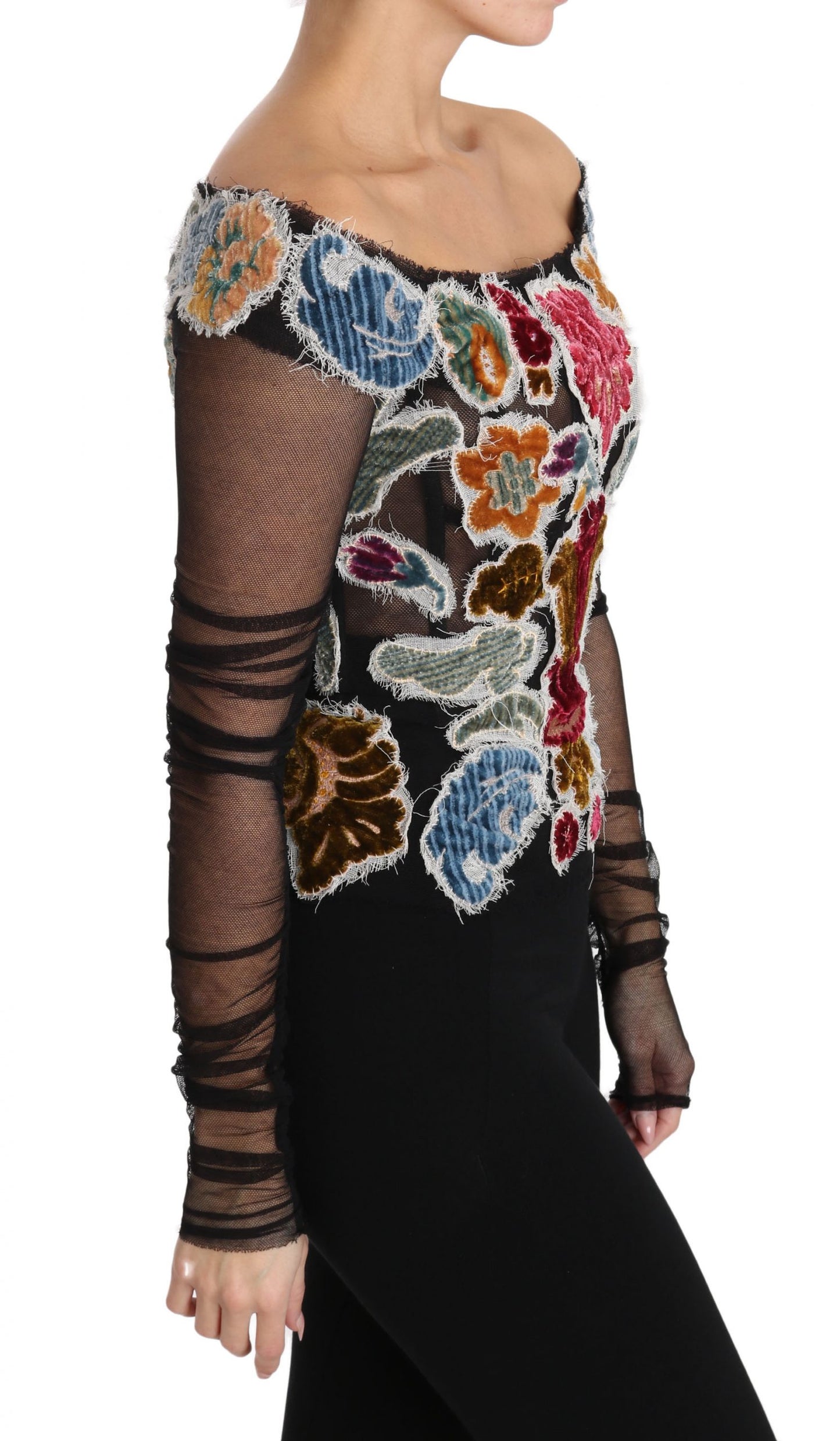 Elegante blusa de manga larga con apliques florales