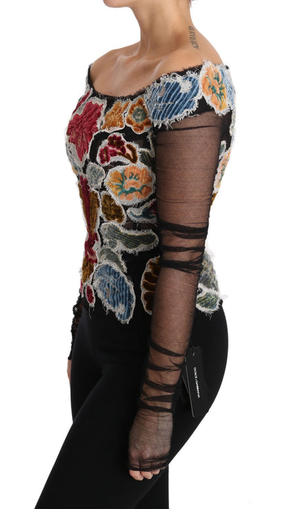 Elegante blusa de manga larga con apliques florales