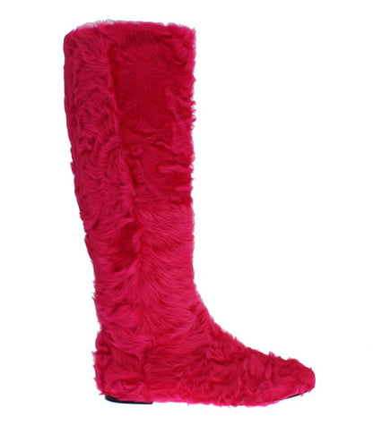 Elegantes botas de piel de cordero rosa