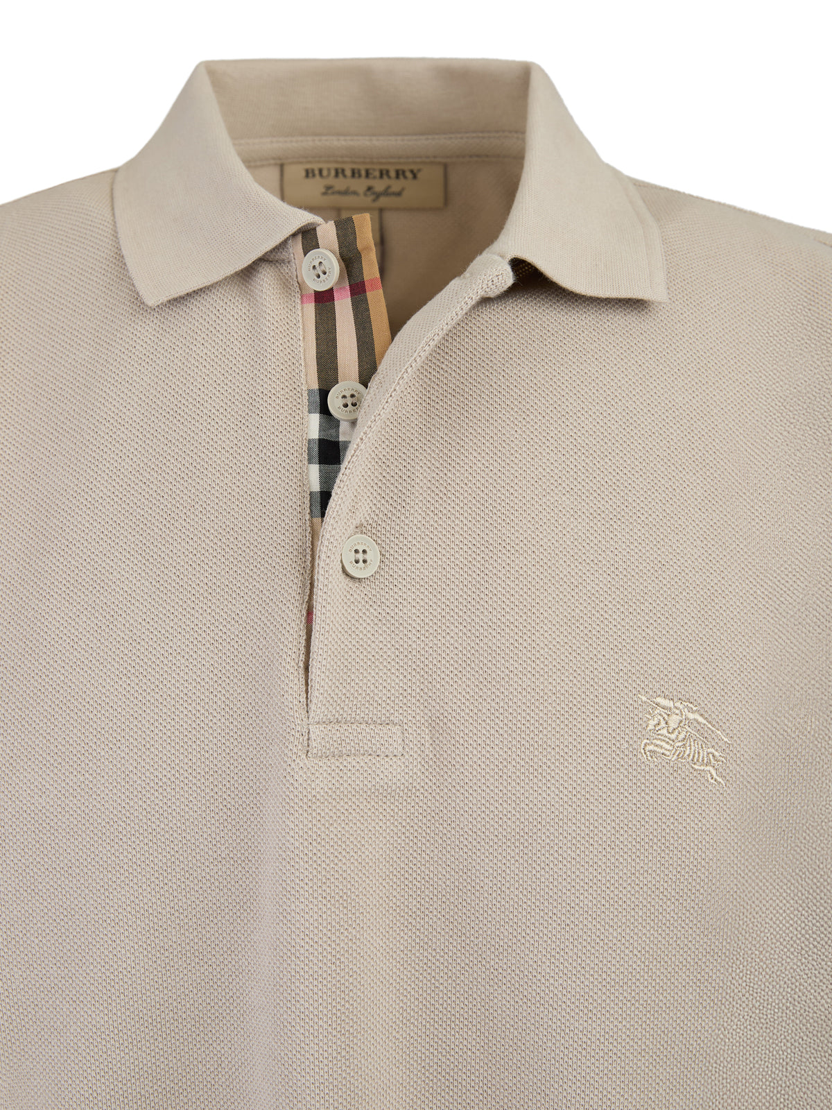 Polo de algodón con cuello en color piedra pálido