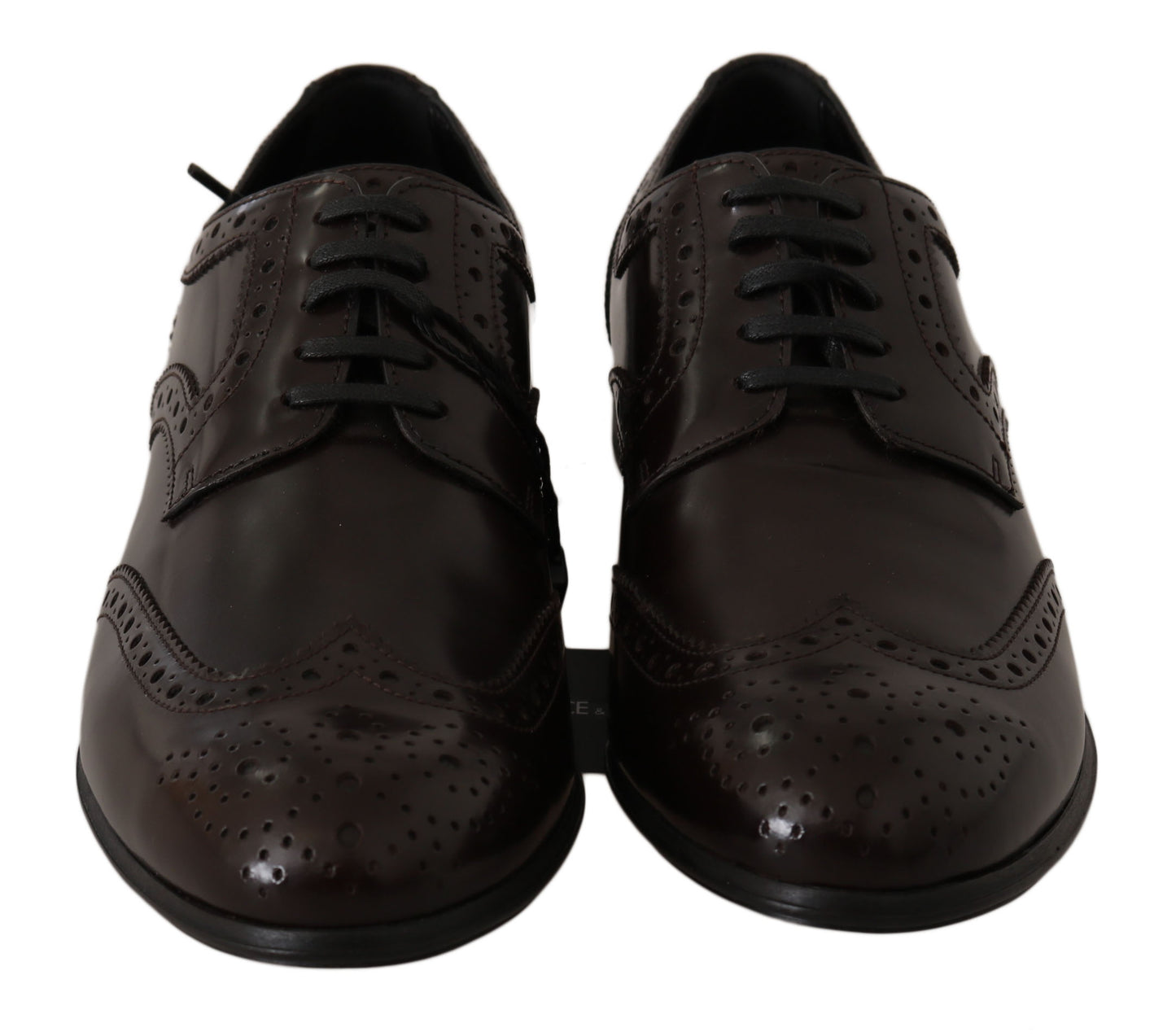 Elegantes zapatos Oxford de piel marrón