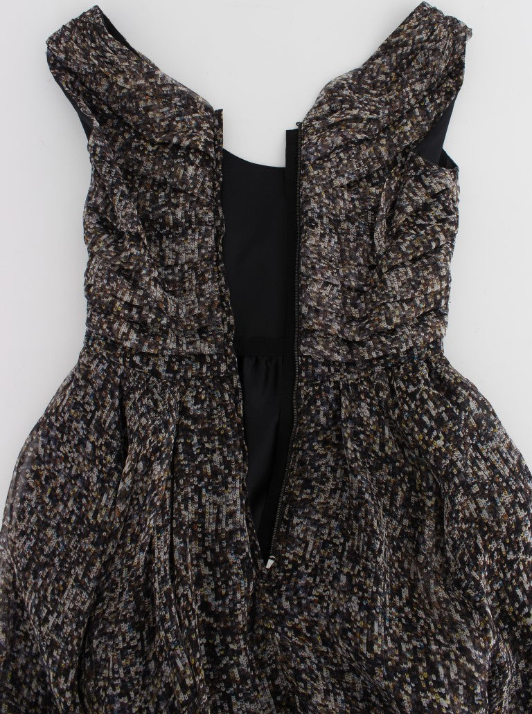 Glamoroso vestido largo de seda con lentejuelas