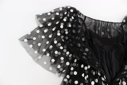 Elegante vestido de lunares con volantes