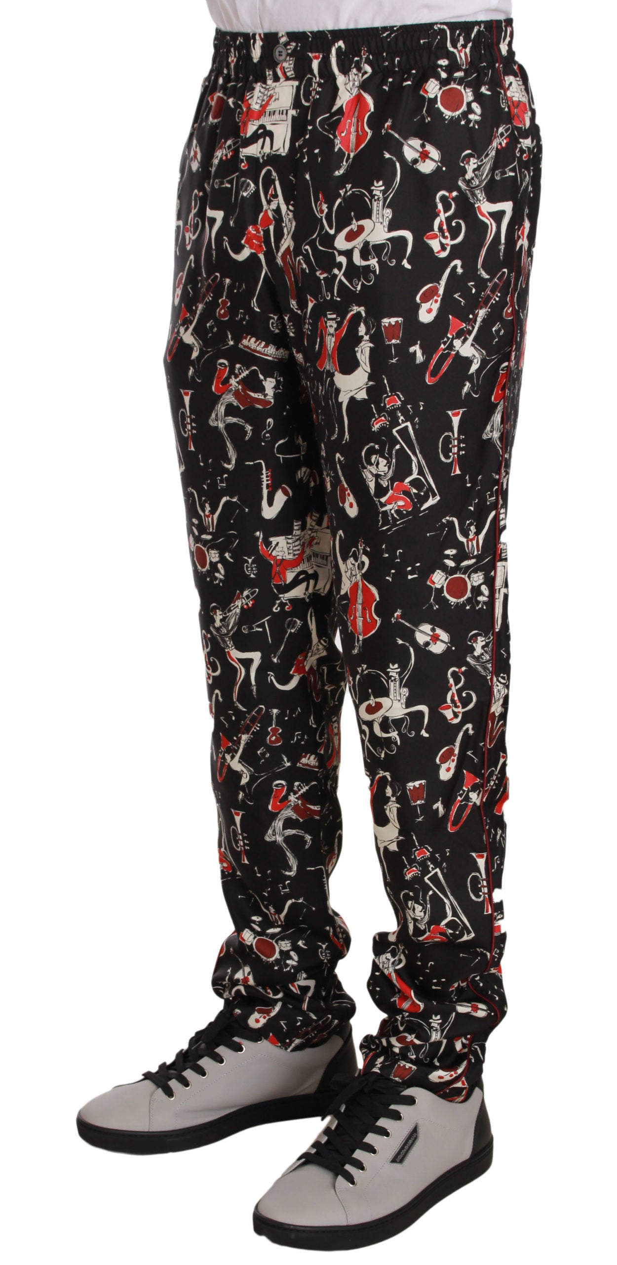 Elegantes pantalones de salón de seda negra con estampado rojo
